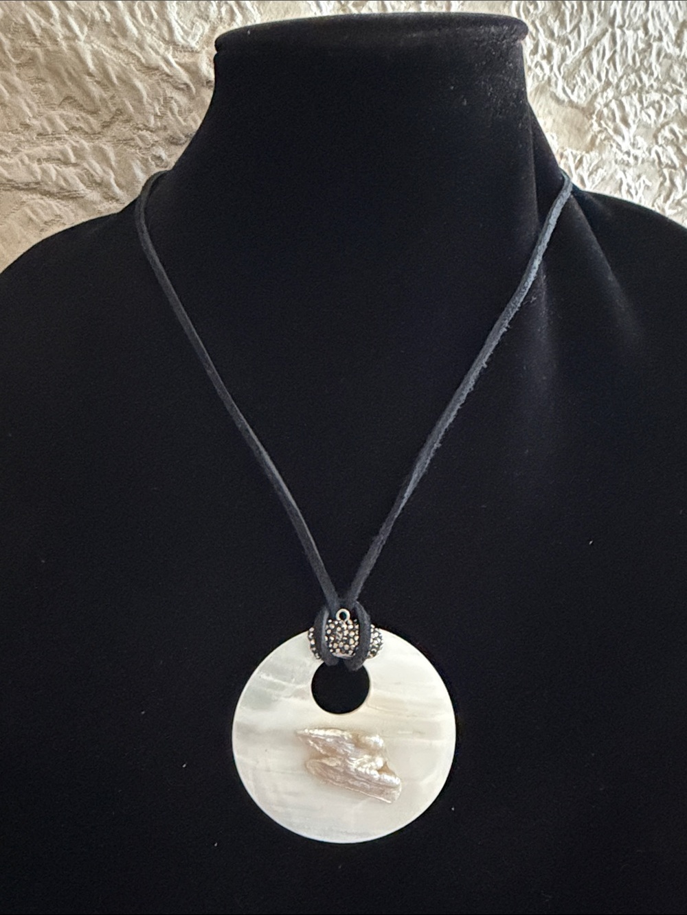 Mother of pearl pendant black leather cord